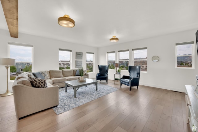 10777 S Lamond Dr W, South Jordan, UT 84009 - living area with wood finished floors and baseboards