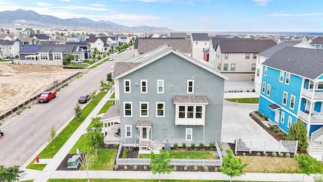 10777 S Lamond Dr W, South Jordan, UT 84009 - view of front of house featuring stucco siding, a residential view, and a mountain view