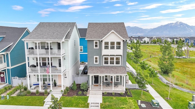 10777 S Lamond Dr W, South Jordan, UT 84009 - view of front of property featuring a patio area, a mountain view, a residential view, and roof with shingles