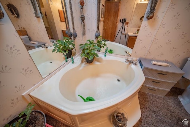 1700 W 2250 N, Helper, UT 84526 - bathroom featuring wallpapered walls and a tub