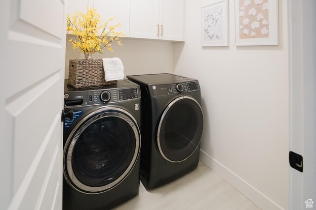 866 S 320 E Unit 168, Spanish Fork, UT 84660 - washroom with independent washer and dryer, cabinet space, baseboards, and tile patterned flooring