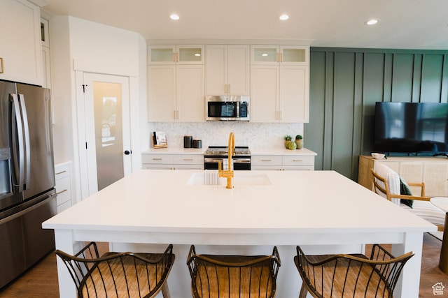 866 S 320 E Unit 168, Spanish Fork, UT 84660 - kitchen featuring stainless steel appliances, tasteful backsplash, light countertops, a sink, and recessed lighting