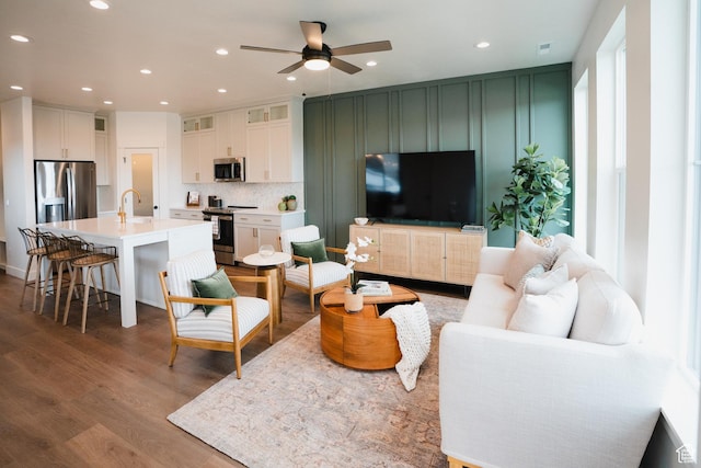 866 S 320 E Unit 168, Spanish Fork, UT 84660 - living area with wood finished floors, a ceiling fan, and recessed lighting