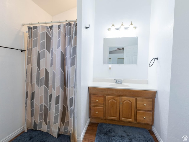 97 N 400 W, Aurora, UT 84620 - full bath featuring vanity, baseboards, curtained shower, and wood finished floors