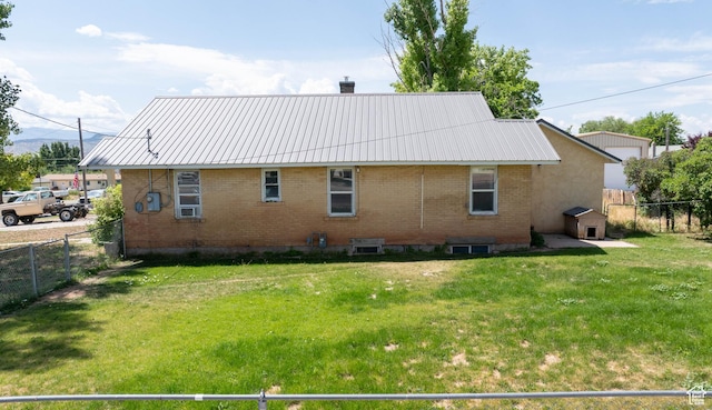 97 N 400 W, Aurora, UT 84620 - back of property featuring brick siding, a chimney, and metal roof