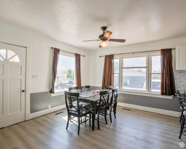 97 N 400 W, Aurora, UT 84620 - dining room with light wood-style floors, healthy amount of natural light, a ceiling fan, and baseboards
