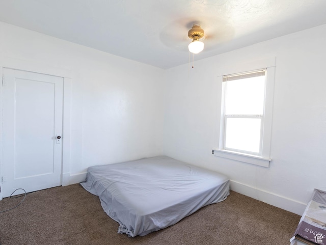 97 N 400 W, Aurora, UT 84620 - carpeted bedroom featuring baseboards and ceiling fan