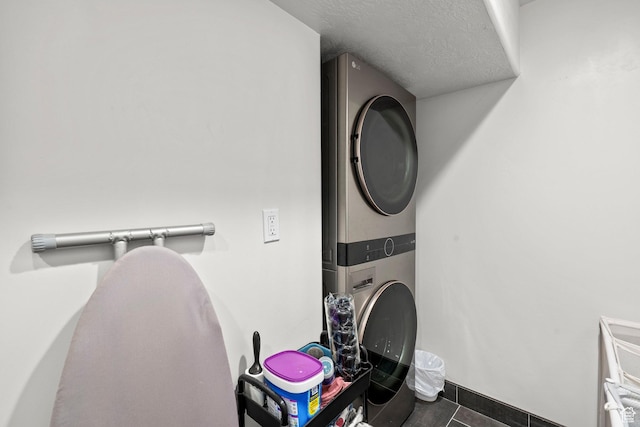 159 E Tranquil Cir, Saratoga Springs, UT 84045 - laundry area featuring estacked washer and dryer and a textured ceiling