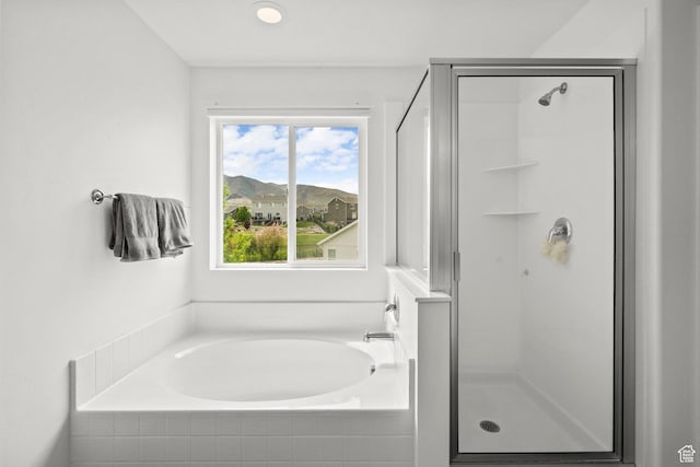 159 E Tranquil Cir, Saratoga Springs, UT 84045 - bathroom featuring a stall shower and a garden tub