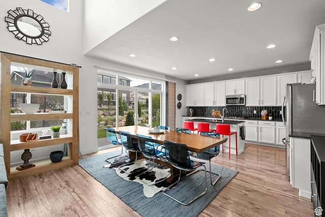 159 E Tranquil Cir, Saratoga Springs, UT 84045 - dining space featuring plenty of natural light, light wood finished floors, and recessed lighting