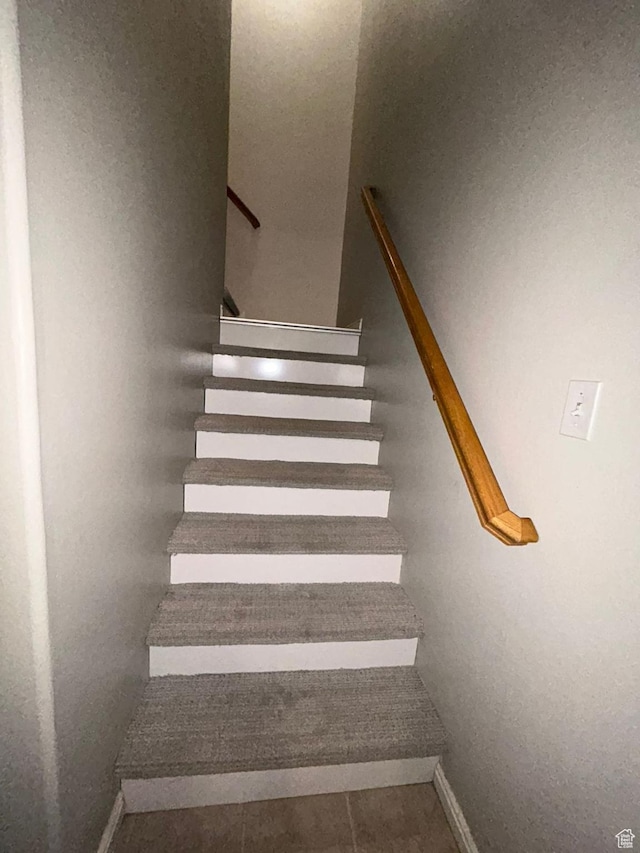3878 W Sage Willow Dr, South Jordan, UT 84009 - stairway featuring baseboards and tile patterned floors