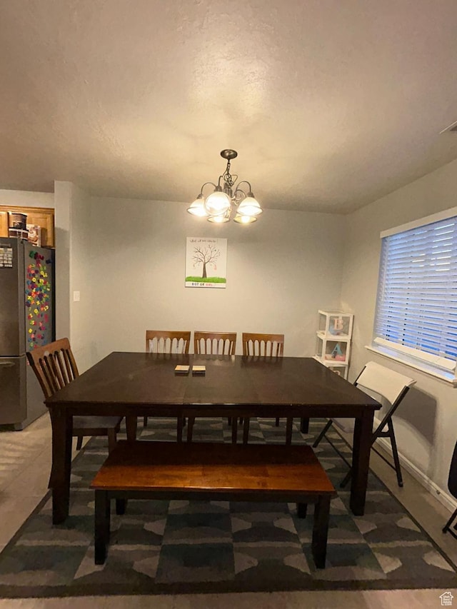 3878 W Sage Willow Dr, South Jordan, UT 84009 - dining space with a chandelier