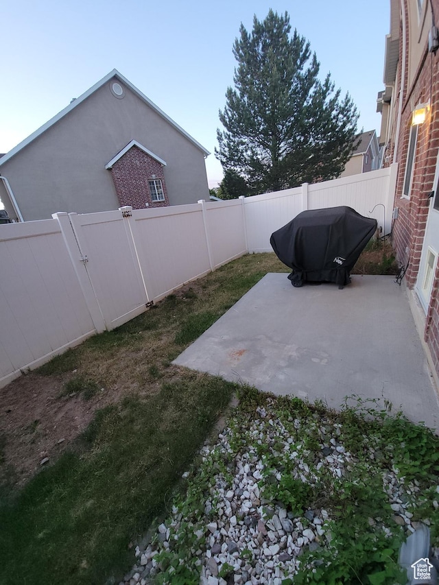 3878 W Sage Willow Dr, South Jordan, UT 84009 - fenced backyard with a patio area