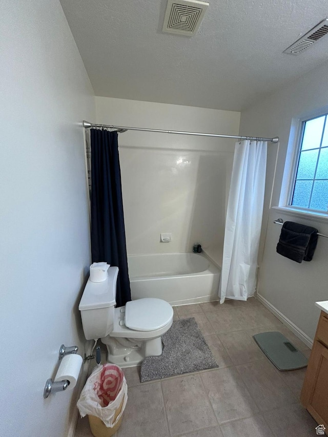 3878 W Sage Willow Dr, South Jordan, UT 84009 - bathroom featuring toilet, shower / bath combo with shower curtain, tile patterned flooring, vanity, and a textured ceiling