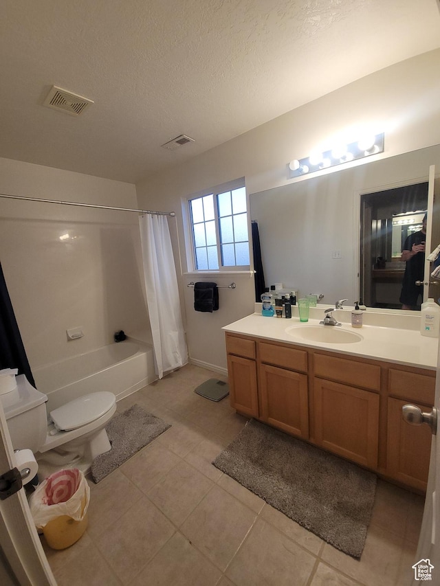 3878 W Sage Willow Dr, South Jordan, UT 84009 - bathroom featuring tile patterned floors, vanity, toilet, shower / tub combo with curtain, and a textured ceiling