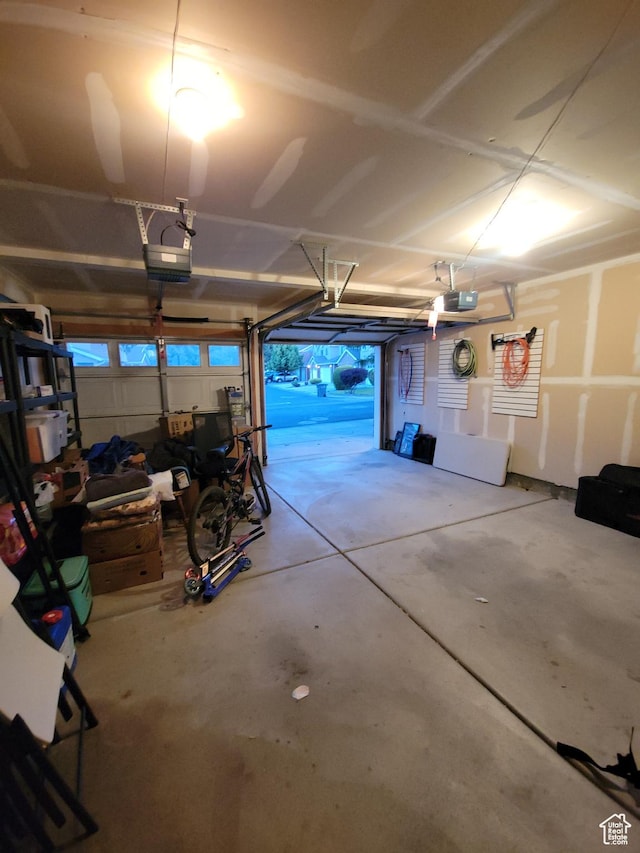 3878 W Sage Willow Dr, South Jordan, UT 84009 - garage featuring a garage door opener