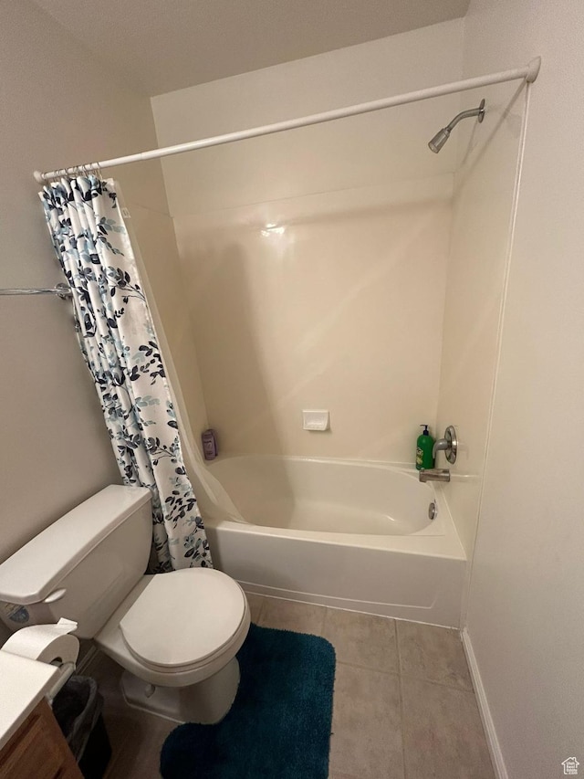 3878 W Sage Willow Dr, South Jordan, UT 84009 - bathroom with toilet, shower / bath combo with shower curtain, tile patterned floors, vanity, and baseboards