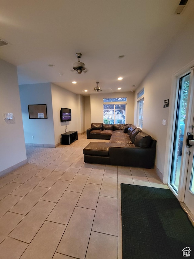 3878 W Sage Willow Dr, South Jordan, UT 84009 - living room featuring light tile patterned floors, recessed lighting, and baseboards