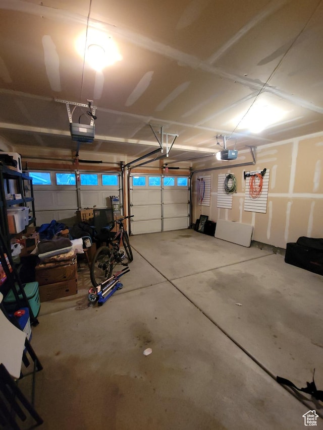 3878 W Sage Willow Dr, South Jordan, UT 84009 - garage featuring a garage door opener