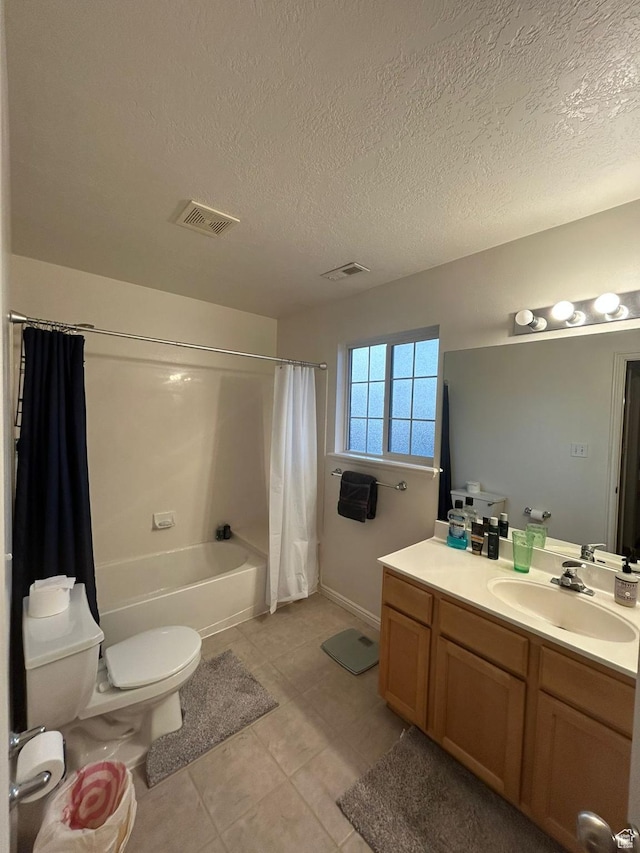 3878 W Sage Willow Dr, South Jordan, UT 84009 - bathroom featuring vanity, toilet, tile patterned flooring, shower / bath combo with shower curtain, and a textured ceiling