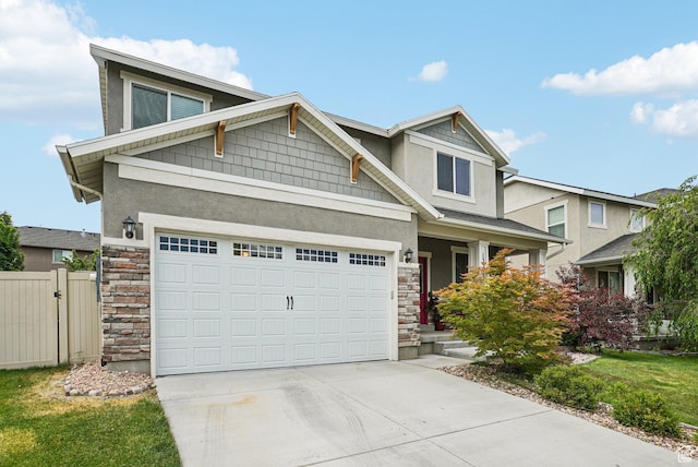 13326 S Rochdale Ln W, Herriman, UT 84096 - view of front of home featuring stone siding, stucco siding, and concrete driveway