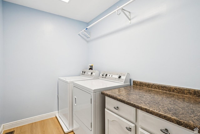 13326 S Rochdale Ln W, Herriman, UT 84096 - laundry room featuring washing machine and dryer and light wood-type flooring