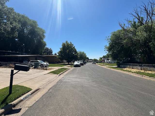 2557 W 5725 S, Roy, UT 84067 - view of asphalt road featuring curbs and sidewalks