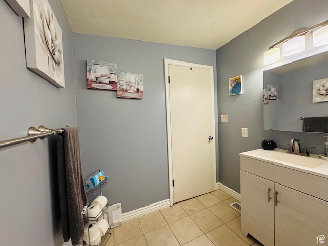 2557 W 5725 S, Roy, UT 84067 - bathroom with vanity, tile patterned floors, and baseboards