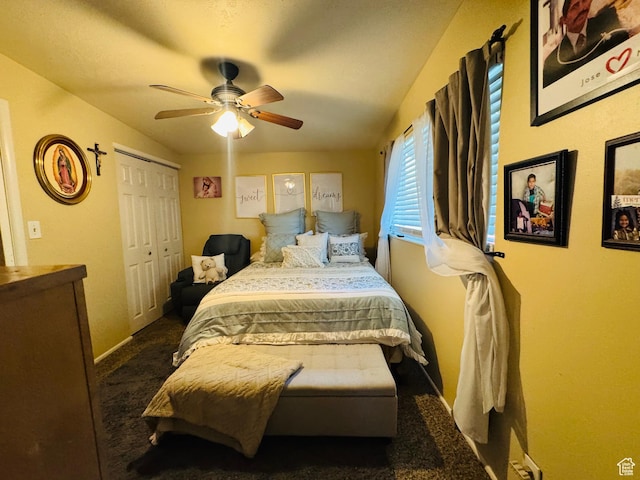 2557 W 5725 S, Roy, UT 84067 - bedroom with dark carpet, baseboards, a ceiling fan, and a closet