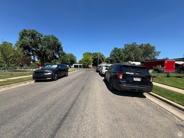 2557 W 5725 S, Roy, UT 84067 - view of asphalt road featuring sidewalks and curbs