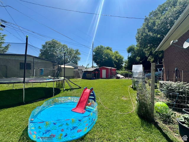2557 W 5725 S, Roy, UT 84067 - view of yard with a trampoline