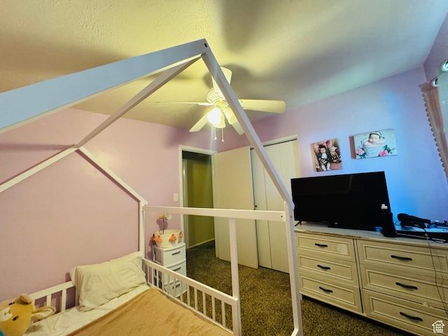 2557 W 5725 S, Roy, UT 84067 - bedroom featuring dark colored carpet, ceiling fan, and a closet