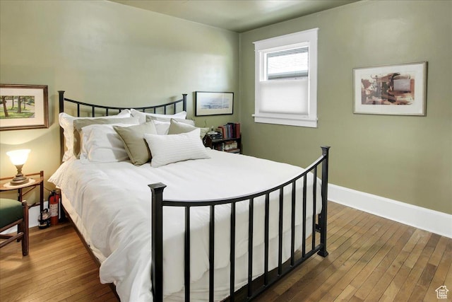 623 E Milton Ave, Salt Lake City, UT 84105 - bedroom with hardwood / wood-style floors and baseboards