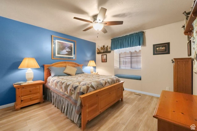 1262 W Dusty Downs Cir S, Jordan, UT 84095 - bedroom with light wood-type flooring, baseboards, and ceiling fan