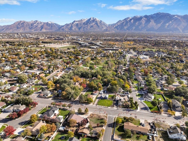 1262 W Dusty Downs Cir S, Jordan, UT 84095 - aerial overview of property's location featuring a mountain backdrop and nearby suburban area