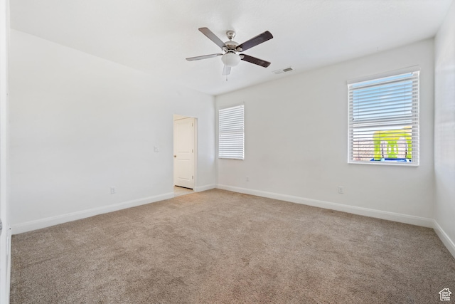 258 N Windsor Dr, Washington, UT 84780 - empty room with light colored carpet, baseboards, and a ceiling fan