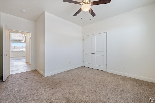 258 N Windsor Dr, Washington, UT 84780 - unfurnished bedroom with carpet flooring, baseboards, ceiling fan, and a closet