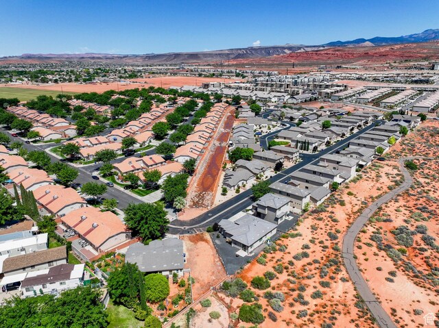 258 N Windsor Dr, Washington, UT 84780 - aerial view of property and surrounding area with a mountain backdrop and nearby suburban area