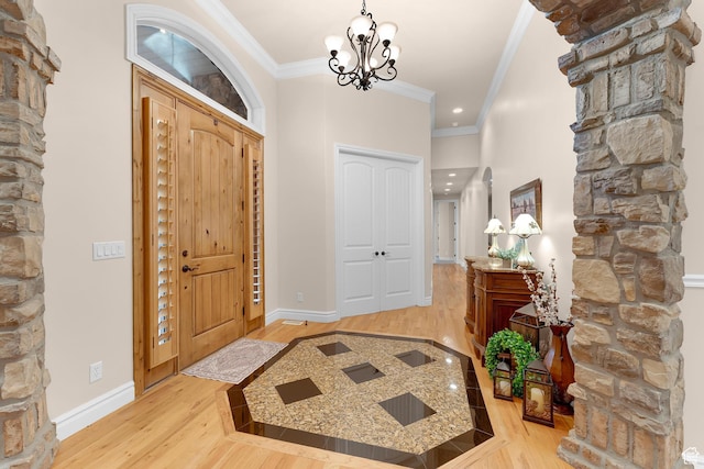 2221 E Fisher Ln S, Salt Lake City, UT 84109 - entrance foyer with light wood-style flooring, crown molding, baseboards, recessed lighting, and a chandelier