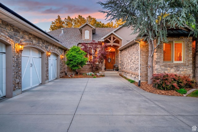 2221 E Fisher Ln S, Salt Lake City, UT 84109 - view of front of house with stone siding and driveway