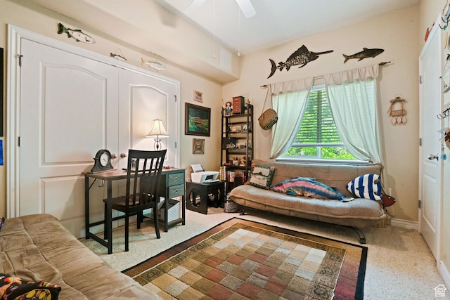 1174 E 3300 S Unit 417, Millcreek, UT 84106 - living area featuring a ceiling fan, carpet, and baseboards