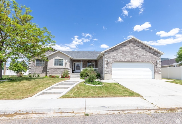 675 S 30 E, Ephraim, UT 84627 - ranch-style house featuring brick siding, an attached garage, and concrete driveway