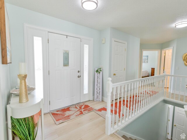 675 S 30 E, Ephraim, UT 84627 - entrance foyer with wood finished floors and a textured ceiling