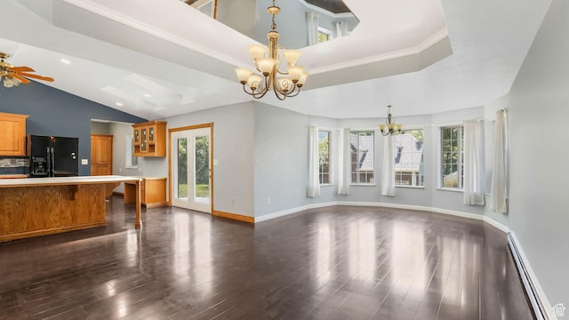 1580 E 1630 N, North Logan, UT 84341 - unfurnished living room featuring a baseboard heating unit, a chandelier, dark wood-style floors, vaulted ceiling, and baseboards