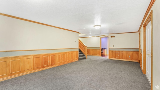 1580 E 1630 N, North Logan, UT 84341 - finished below grade area featuring ornamental molding, a wainscoted wall, carpet floors, and stairway