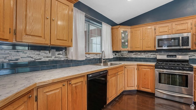 1580 E 1630 N, North Logan, UT 84341 - kitchen featuring appliances with stainless steel finishes, a sink, vaulted ceiling, dark wood finished floors, and light countertops