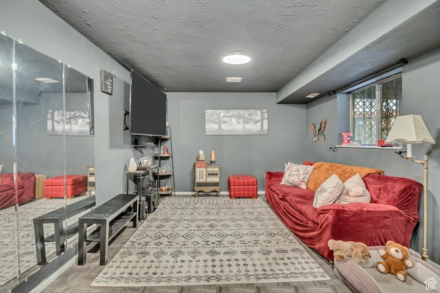1219 W Middlesex Rd, Taylorsville, UT 84123 - living area with baseboards and a textured ceiling