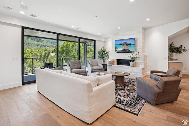 1988 Stone Creek Rd Unit 19, Park City, UT 84098 - living area featuring light wood-style flooring, a fireplace, and recessed lighting