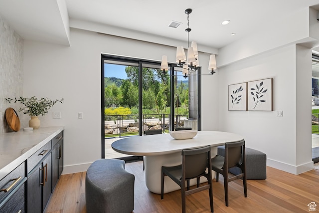1988 Stone Creek Rd Unit 19, Park City, UT 84098 - dining space featuring a chandelier, light wood-style floors, baseboards, and recessed lighting