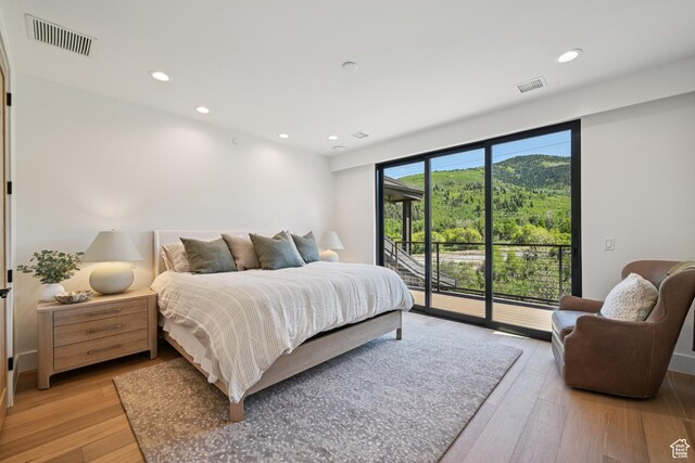 1990 Stone Creek Rd Unit 20, Park City, UT 84098 - bedroom with access to outside, light wood-style flooring, and recessed lighting